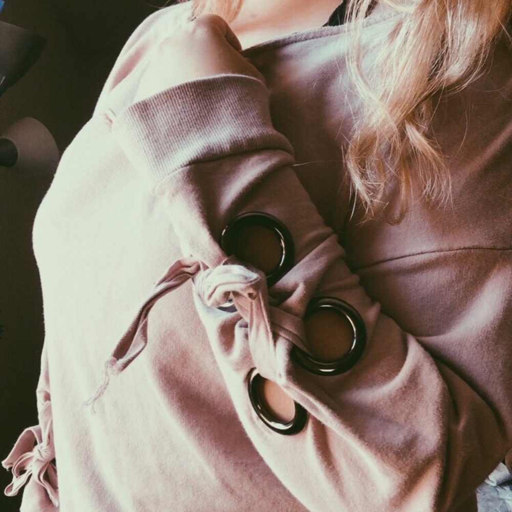 Boutique Sweater with cute tie ups at the end